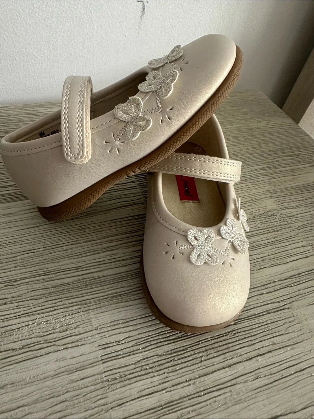 Rachael shows Girls Cream Mary Jane Dress Shoes with Flower Appliqués size 8